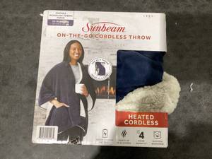lot 684 image: Sunbeam On-The-Go Throw Poseidon Microplush Sherpa (Faux Shearling), 4 Heat Settings, Cordless Heated Blanket, 50 x 60