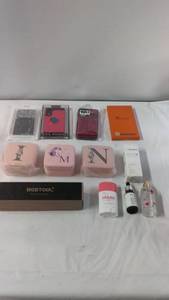 Collection of Phone Cases, Organizer Boxes, and Skincare Products