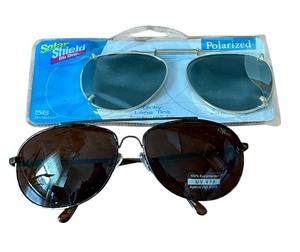 lot 121 image: Sunglasses by Flyboy and Clip On Polarized Lenses