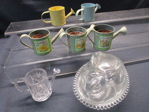 lot 13 image: Nesting Rabbit, Mini Sprinkling Cans