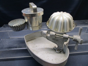 lot 73 image: Nut Cracker Pan, Molds
