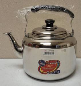 lot 24 image: (1) YiXin Kettle with Sound & (8) Boxes of Moringa Tea