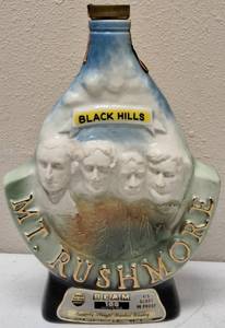 lot 40 image: Vintage Black Hills - Mt Rushmore - Jim Beam Straight Bourbon Whisky Bottle Empty  (View Photos)