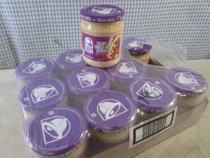 lot 223 image: (B-2) 12 Jars of Taco Bell Creamy C...
