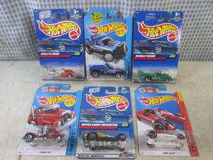 lot 26 image: (EC1) Assorted Hot Wheels in Packag...