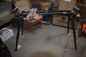 lot 75 image: WEN MSA330 Collapsible Rolling Miter Saw Stand with 3 Onboard Outlets