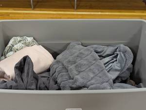 lot 69 image: 45 Gallon Tote Filled with Mixed Plush (Bedding,Curtains,MatsRugs,Etc) - Tote not included