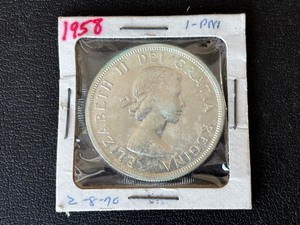 lot 65 image: 1958 Canada Silver Dollar British Columbia