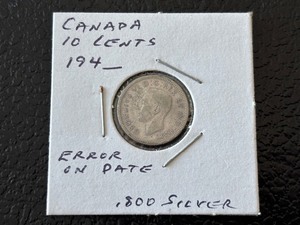 lot 31 image: Canada Silver 10 Cent Error Coin Missing Number 194