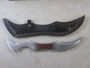 lot 57 image: (EW3) Double Blade Wood Handle Fixe...