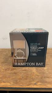 lot 24 image: Hampton Bay Windmere Table Lamp with Glass Body and Black Metal Accents