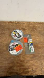 lot 114 image: Collection of 3 Tools Including Foil Mastic Sealant Tape and Drywall Scraper
