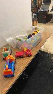 lot 186 image: Collection of Colorful Plastic Toy Vehicles in Storage Bin
