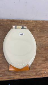 lot 216 image: Elongated Plastic Toilet Seat with Hinges - Beige