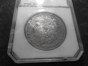 lot 9 image: 1883 O Morgan Silver Dollar Graded MS64