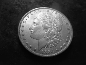 lot 10 image: 1884 O Morgan Silver Dollar