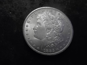 lot 12 image: 1885 O Morgan Silver Dollar