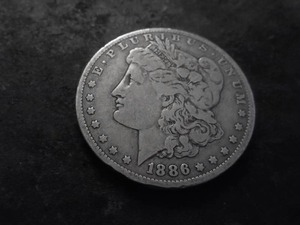 lot 14 image: 1886 O Morgan Silver Dollar