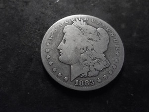lot 44 image: 1883 CC Morgan Silver Dollar