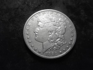 lot 45 image: 1884 S Morgan Silver Dollar