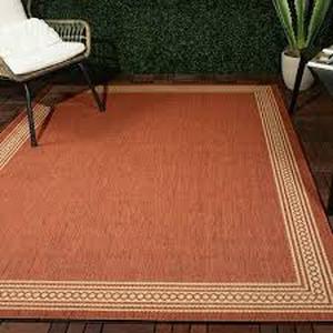 Hampton Bay Rust with Tan Border 5 ft. 3 in. x 7 ft. IndoorOutdoor Patio Area RugCustomer Returns See Pictures