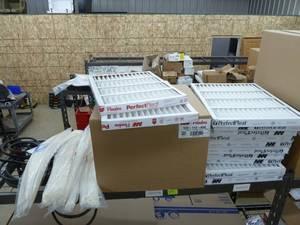lot 57 image: Furnace Filters & Belts
