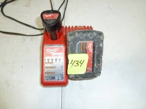 lot 434 image: Milwaukee Charger with 20-18V Batteries, M12V