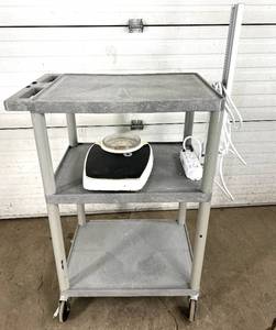 lot 17 image: Luxor Medical Supply Storage Cart with Tripp-Lite Power Outlet & Vintage Scale - In Good Condition Update 26 645pm - detected small crack on bottom of shelf near pole - may not be able to take a lot of weight on the whole cart