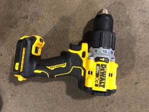 lot 11 image: DEWALT 20V Compact Cordless 12 in. Hammer Drill (Tool Only)  Customer Returns See Pictures