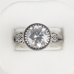 Round Cut Cz Curly-Qsterling Silver Ring. Size 7 - 7.25.