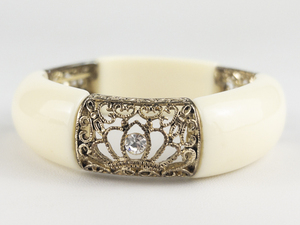 Faux Bone Gold Tone Base Metal Stretch Bracelet.