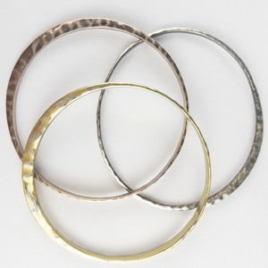 RLM Studio (Robert Lee Morris) Set Of Three Tapered Brass, Sterling Silver & Copper Bangles.