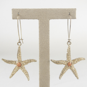 Starfish With Coral Colored Center Gold Tone Base Metal French Wire Earrings .