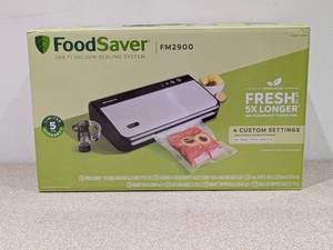 lot 58 image: FOOD SAVER VACUUM SEALING SYSTEM