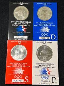 lot 05 image: GROUP OF 4 US 1983 OLYMPIC SILVER DOLLARS BU