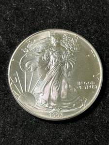 lot 12 image: 1993 AMERICAN SILVER EAGLE 1 TROY OZ .999 FINE SILVER