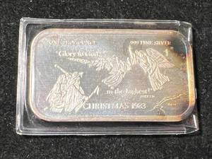 lot 13 image: 1 TROY OZ .999 FINE SILVER CHRISTMAS 1983 BAR