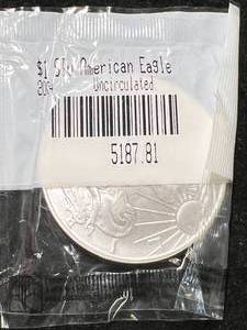 lot 40 image: 2004 AMERICAN SILVER EAGLE 1 TROY OZ .999 FINE SILVER
