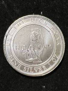 lot 45 image: 1 TROY OZ .999 FINE SILVER LION ROUND