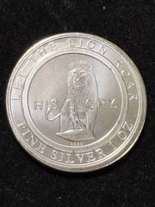 lot 84 image: 1 TROY OZ .999 FINE SILVER LION ROUND