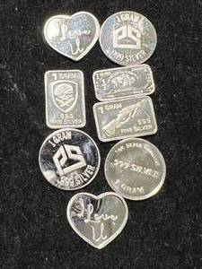 lot 91 image: 8 GRAMS .999 FINE SILVER FRACTIONAL PIECES