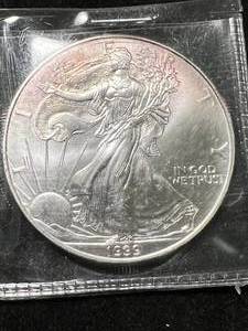 lot 96 image: 1999 AMERICAN SILVER EAGLE 1 TROY OZ .999 FINE SILVER