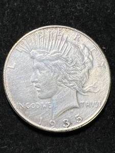 lot 111 image: 1935 US PEACE SILVER DOLLAR XF45