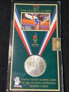 lot 114 image: 1996 US OLYMPIC GAMES SILVER DOLLAR