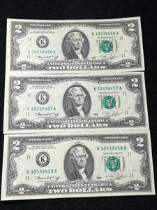 lot 125 image: 3 CONSEC. SERIAL NUMBERED $2 BILLS