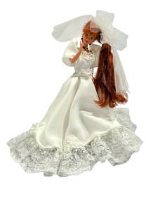 lot 15 image: Vintage Wedding Barbie with White Dress & Stand (Stamped Mattel Inc 1976 on Neck)