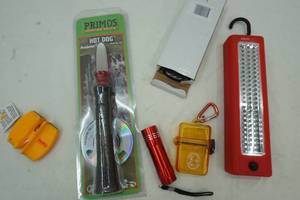 lot 12 image: Predator call, knife sharpener, flashlights