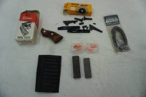 lot 102 image: New pistol grip, shell stock holder, Weaver Mount tip off