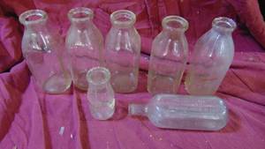 lot 165 image: 7- Glass Milk Bottles and Other Bottle