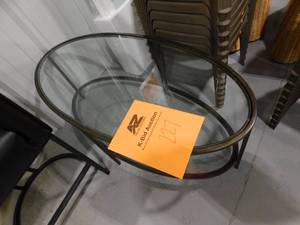 lot 227 image: Home Decorators Collection Bella Large Oval Antique Bronze Metal and Glass Coffee Table with Shelf (46 in. W x 18 in. H)